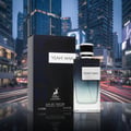 Maison Alhambra Yeah by Maison Alhambra 100ml EDP Men — A perfume bottle and its box are displayed in front of a blurred city skyline at night, with light trails from traffic.