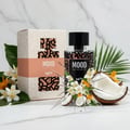 Mood Perfume Mood Naif For Her – 100 ml for Women, featuring the perfume bottle and its box, surrounded by coconut slices, white and orange flowers, and green leaves on a marble background.