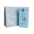 Osma Osma Bonjour Oriental Blossoms 150ml EDP — Beg hadiah biru muda corak bunga dan logo Osma bersebelahan kotak minyak wangi biru muda reka bentuk daun maple dan tulisan Osma Bonjour.