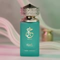 Paris Corner Khair Pistachio 100ml EDP — A tall, rectangular teal perfume bottle with gold Arabic calligraphy and text 'KHAIR PISTACHIO PARIS CORNER'. It has an ornate gold and silver textured cap.