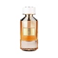 Paris Corner Super Crush Emir by Paris Corner — A tall, clear glass perfume bottle with a metallic gold-toned body and a white cap. The bottle contains amber-colored perfume.