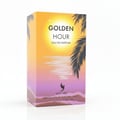 Volare Golden Hour by Volare 100ml EDP untuk Wanita — Kotak minyak wangi segi empat dengan pemandangan pantai matahari terbenam, pokok palma, dan teks "GOLDEN HOUR EAU DE PARFUM" serta "VOLARÉ VAPORISATEUR NATURAL SPRAY 100ML 3.4FL.OZ"