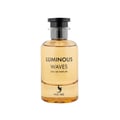 Volare Luminous Waves Eau de Parfum — Botol kaca jernih berisi cecair keemasan, bertudung hitam dan perak, serta logo burung Volare.