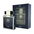 Zimaya Abadi Opulent by Zimaya EDP 100ml Men — Botol wangian segi empat bersalut perak dengan penutup kristal hitam dan perak, berdiri di sebelah kotak hadiah biru gelap bertekstur.
