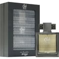Zimaya Abadi Saga by Zimaya EDP 100 ml Men — Kotak hadiah hitam dengan tingkap lutsinar bertekstur, memaparkan botol minyak wangi segi empat kelabu gelap dengan cecair keemasan dan penutup kelabu gelap.