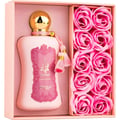 Zimaya Fatima by Zimaya 100ml Extrait de Parfum Women — Pink perfume bottle with gold cap and tassel, presented in a pink box with a compartment filled with pink rose soaps.
