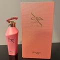 Zimaya Hawwa Pink by Zimaya Women 100ml EDP — Pink perfume bottle with a decorative gold and pink ring cap, next to its textured pink box.