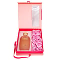 Zimaya Only You by Zimaya Perfume Elixir 100ML EDP — A pink gift box opened to reveal a bronze perfume bottle with a gold cap, alongside a row of pink soap roses.