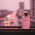 Zimaya Only You by Zimaya Perfume Elixir 100ML EDP — Pink perfume bottle with gold cap, set against a rainy window with blurred city lights.