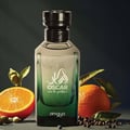 Zimaya Oscar by Zimaya 100ml EDP Men — A clear glass perfume bottle with a black cap, featuring green gradient liquid, with a sliced orange and whole orange, cardamom pods, and peppercorns arranged around it.