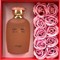 Zimaya Only You by Zimaya Perfume Elixir 100ML EDP — Frosted brown perfume bottle with gold cap and pink wavy detail, next to a box of pink rose-shaped soaps.