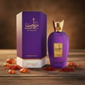 Zimaya Rabab Gems by Zimaya 100ml EDP Unisex — Purple hexagonal box and matching purple bottle with gold accents, surrounded by saffron threads and amber-colored resin pieces on a wooden surface.