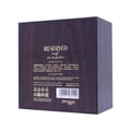 Zimaya Reserved Oud EDP — Close-up of the back of a dark brown perfume box with gold lettering and Arabic text. Includes ingredients, warnings, and barcode.