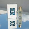 Zimaya Reflect by Zimaya 100ml EDP Unisex — White box and clear glass perfume bottle with gold cap, reflected on a mirrored surface.