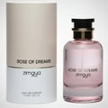 Zimaya Rose of Dreams — Pink perfume bottle and cylindrical box with gold accents and black cap, set against a white background.