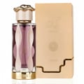 Lattafa Teriaq by Lattafa 100ml EDP Unisex — A clear glass perfume bottle with purple liquid, ornate gold snake-like cap, and a beige box with gold accents, presented on a white background.
