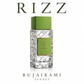 Bujairami Rizz by Bujairami 100ml Extrait — Clear faceted glass perfume bottle with a green cap and a green label featuring a gold crown and 'B' logo, set against a white background with the brand name 'RIZZ' above and 'BUJAIRAMI SYDNEY' below.