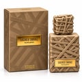 French Avenue Sacred Smoke — Kotak dan botol emas bertekstur dengan rekaan anyaman, label emas.