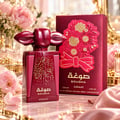 Asdaaf Sougha — Red perfume bottle with gold speckles and ornate floral embossed red box with gold accents and bow