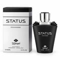 TADangel Status by TADangel 100ml EDP Lelaki — Botol hitam matte dengan penutup perak dan reben hiasan, bersebelahan kotak berjalur hitam peraknya.