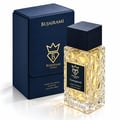 Bujairami Tempted — Gold-toned perfume bottle with intricate geometric glass pattern and dark wood cap, next to a navy blue leather presentation box with gold logo.