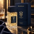 Bujairami Tempted by Bujairami 100ml Extrait Unisex — Gold-toned faceted glass perfume bottle with a dark textured cap, featuring a black label with gold crown and text.