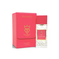 Bujairami Too Damn Clean 100ml Extrait — Pink leather box and clear faceted glass perfume bottle with pink label and gold crown logo, set against a white background.