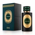 French Avenue Unknown Absolus Les Extraits — Botol minyak wangi hitam berlabel emas berukir dan penutup bertatahkan permata hijau, bersebelahan dengan kotak hijau gelap dan hitam sepadan beraksen emas.