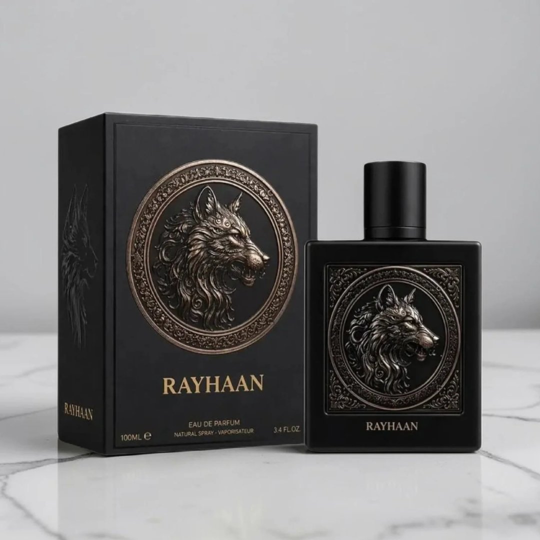 Rayhaan Wolf by Rayhaan 100ml EDP for Men — Black perfume box and bottle with embossed wolf head emblem, gold accents, on a marble surface.